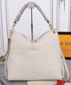 Louis Vuitton Monogram Empreinte Leather Maida Hobo In Cream
