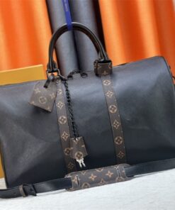 Louis Vuitton Taiga Leather Keepall Bandouliere 45 In Black And Monogram Macassar Canvas