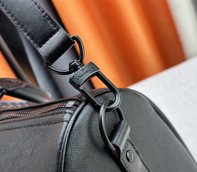 Louis Vuitton Taiga Leather Keepall Bandouliere 45 In Black And Monogram Macassar Canvas - Image 9