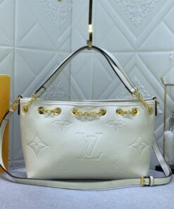 Louis Vuitton Monogram Empreinte Leather Bundle Bag In Cream