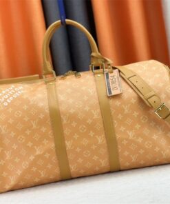 Louis Vuitton Monogram Heritage Canvas Keepall Bandouliere 50 In Yellow