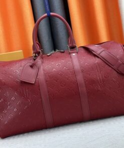 Louis Vuitton Taurillon Leather Keepall Bandouliere 50 In Sari Red