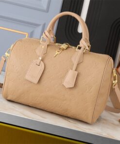 Louis Vuitton Monogram Empreinte Speedy Soft 30 Handbag In Apricot