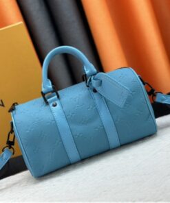 Louis Vuitton Taurillon Monogram Leather Keepall Bandouliere 25 In Turquoise