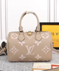 Louis Vuitton Bicolor Monogram Empreinte Leather Speedy Bandouliere 25 Handbag In Tourterelle Gray And Cream