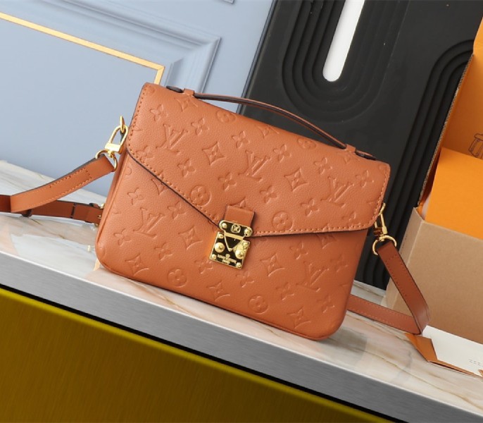 Louis Vuitton Monogram Empreinte Metis Handbag In Cognac Brown