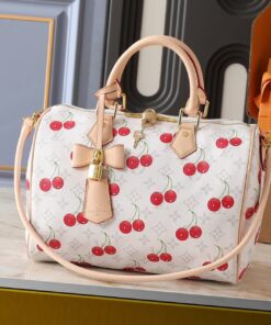 X TM Monogram Cherry Canvas Speedy Soft Bandouliere 30 In White
